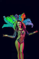 Image showing Beautiful young woman in carnival peacock costume