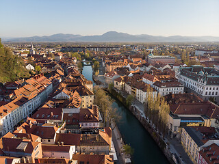 Image showing Aerial drone panoramic view of Ljubljana, capital of Slovenia in warm afternoon sun