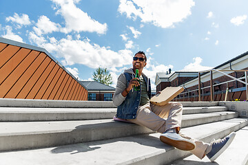 Image showing indian man with pizza and drinking beer outdoors