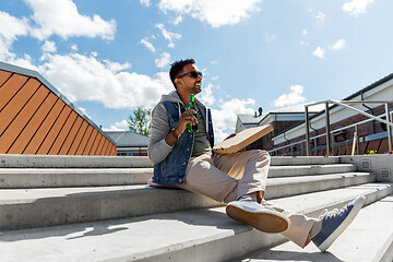 Image showing indian man with pizza and drinking beer outdoors