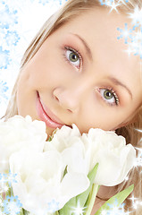 Image showing happy girl with white tulips