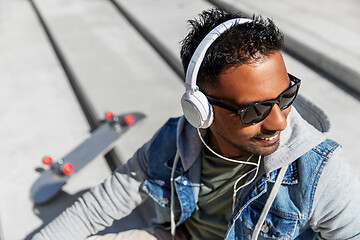 Image showing indian man in headphones listening to music