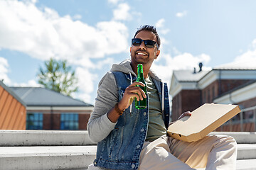 Image showing indian man with pizza and drinking beer outdoors