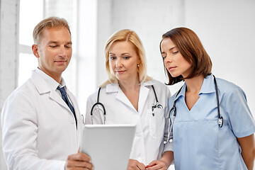 Image showing group of doctors with tablet computer at hospital