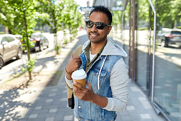 Image showing indian man with bag and takeaway coffee in city