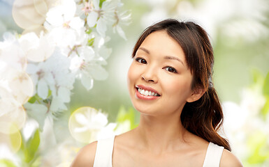 Image showing face of happy smiling young asian woman