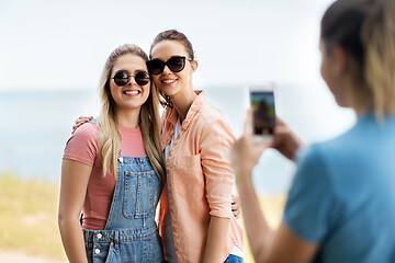 Image showing teenage girls or best friends being photographed