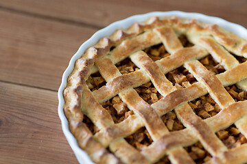 Image showing close up of apple pie on wooden table