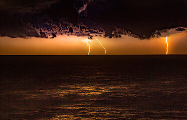 Image showing Storm over the ocean with lightning