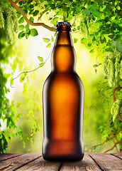 Image showing Brown bottle with beer