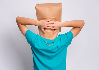 Image showing Boy with paper bag over head