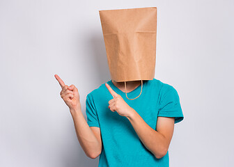 Image showing Boy with paper bag over head