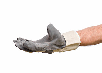 Image showing Male hand wearing working glove