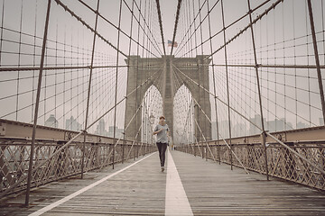 Image showing Running on Brooklyn bridge