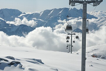 Image showing Ski lift cabin in snowy mountain landscape