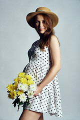 Image showing Pregnant woman in white boyfriend shirt over white background