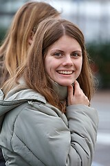 Image showing Portrait of a young woman on a street