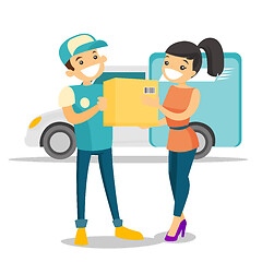 Image showing A courier delivering a package to a woman.