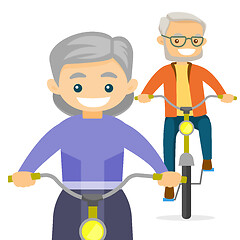 Image showing An old couple riding bikes.