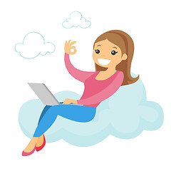 Image showing A woman on a cloud working on a laptop and showing ok sign.