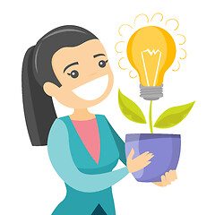 Image showing A businesswoman with a lightbulb as a symbol of business idea.