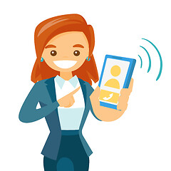 Image showing A woman holding a smartphone.