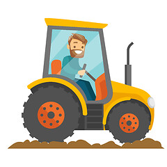 Image showing A white happy farmer in tractor on a rural farm field.