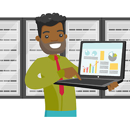 Image showing Black man in data center with a laptop