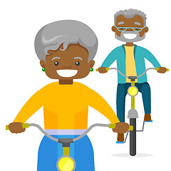 Image showing An old couple riding bikes.