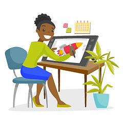 Image showing A black woman graphic designer works at the office desk.