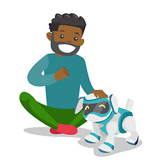 Image showing Black man playing with dog robot
