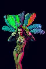 Image showing Beautiful young woman in carnival peacock costume