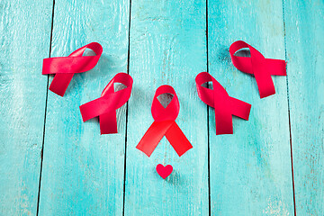 Image showing Aids Awareness Sign Red Ribbon. World Aids Day concept.