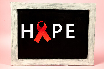 Image showing Aids Awareness Sign Red Ribbon. World Aids Day concept.