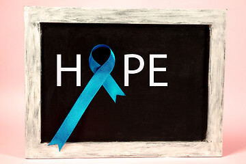 Image showing Blue ribbon symbolic of prostate cancer awareness campaign and men\'s health in November