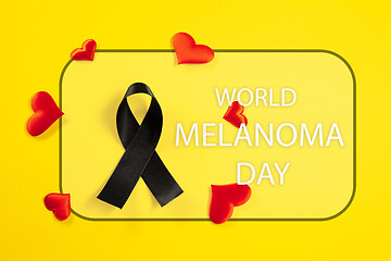 Image showing Black ribbon-symbol of fight against melanoma and skin cancer.