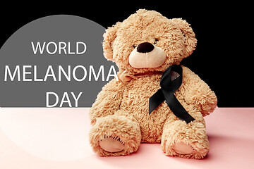 Image showing Black ribbon-symbol of fight against melanoma and skin cancer.