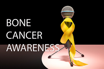 Image showing Yellow ribbon symbolic color for Sarcoma Bone cancer awareness and suicide prevention