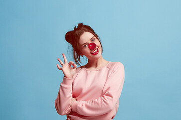 Image showing Happy woman on red nose day.