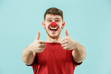 Image showing Happy man on red nose day.