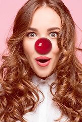 Image showing Happy woman on red nose day.