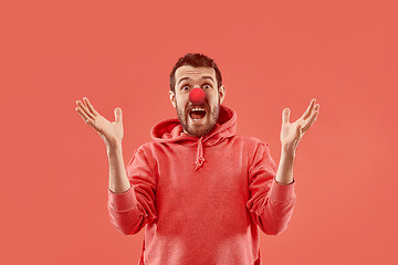 Image showing Happy man on red nose day.