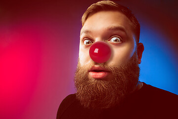 Image showing Happy man on red nose day.