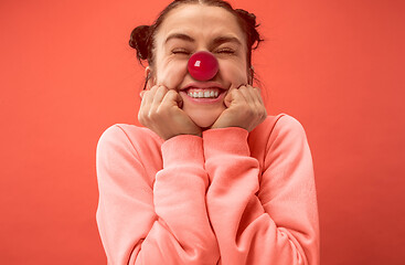 Image showing Happy woman on red nose day.
