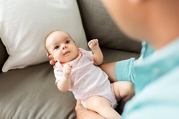 Image showing middle aged father with baby daughter at home