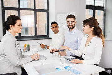 Image showing recruiters having job interview with employee