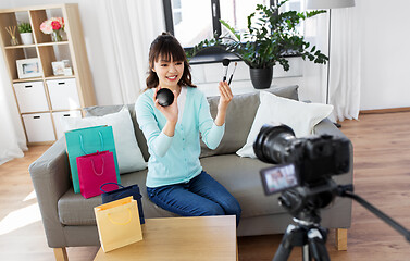 Image showing female beauty blogger making video about make up