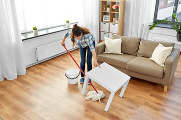 Image showing woman or housewife with mop cleaning floor at home