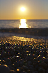 Image showing Beautiful seascape, amazing view of pebble coastline in mild sun