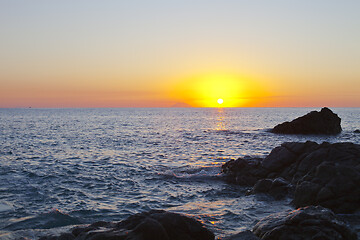 Image showing Sunset on the rocky shore. Tyrrhenian Sea.